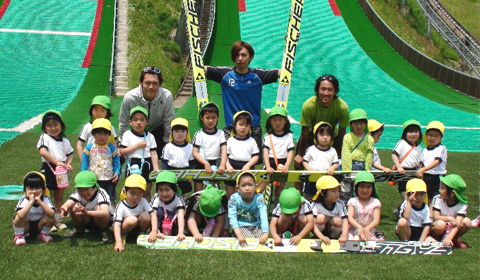 Ski Team members with kindergarten children